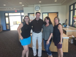 6B Teachers Mrs. Sturtevant, Mr. Conley, Mrs. Crowley and Mrs. Lynch pose for a photo in the Learning Commons.